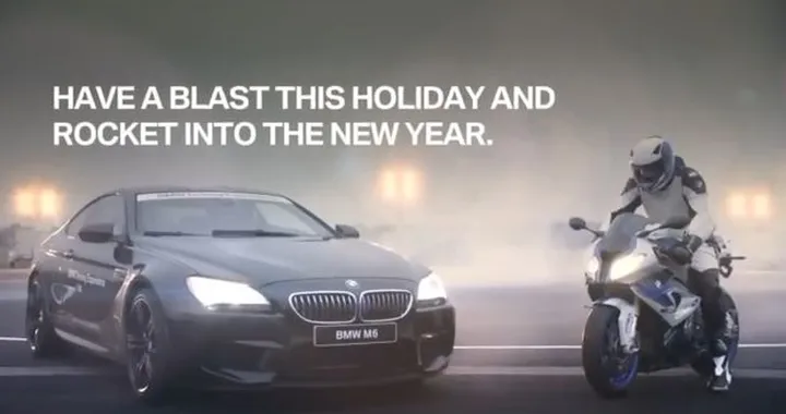 BMW M6 vs BMW S1000RR HP4: gli auguri di BMW /video