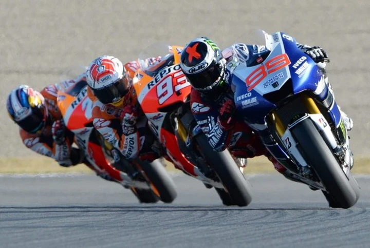 Pagelle Motegi 2013: Lorenzo, “lezione” da prof. Festa rinviata per Marquez il gladiatore
