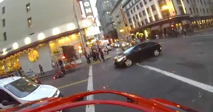 The death of my D675 and birth of my Ninja skills:  Idiot cager blows red light