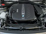 BMW si aggrappa ai motori termici: 