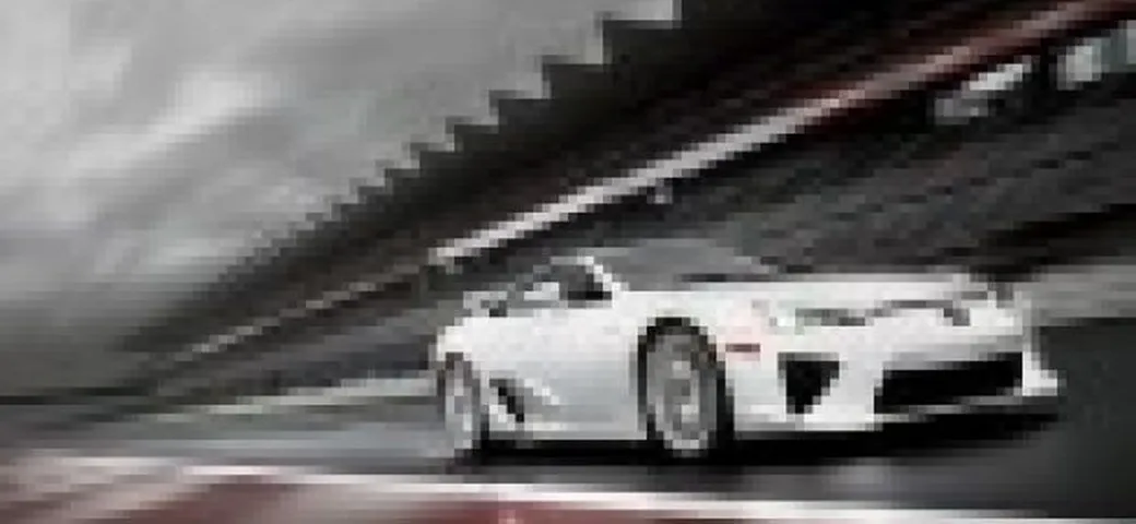 Video: Ferrari 599 HGTE VS Lexus LFA