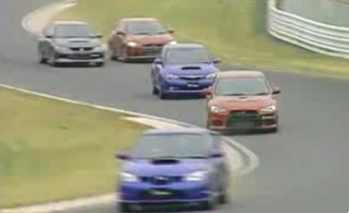 Video: EvoX vs WRX STI