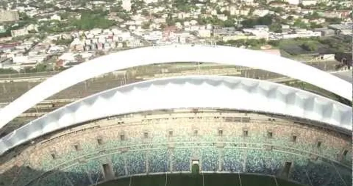 Brian Capper conquers the arch of Moses Mabhida on a motorcycle