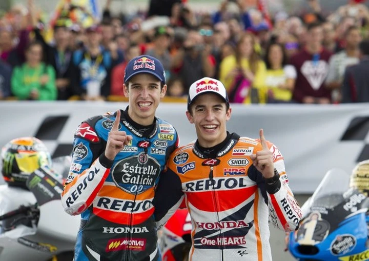 MotoGP Valencia 2014, Marquez fa festa con il fratello Alex: 