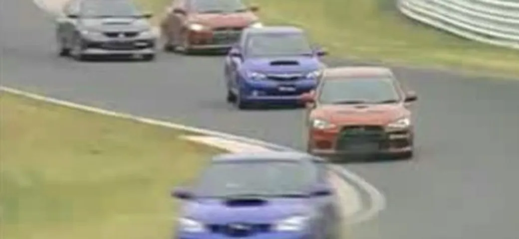 Video: EvoX vs WRX STI