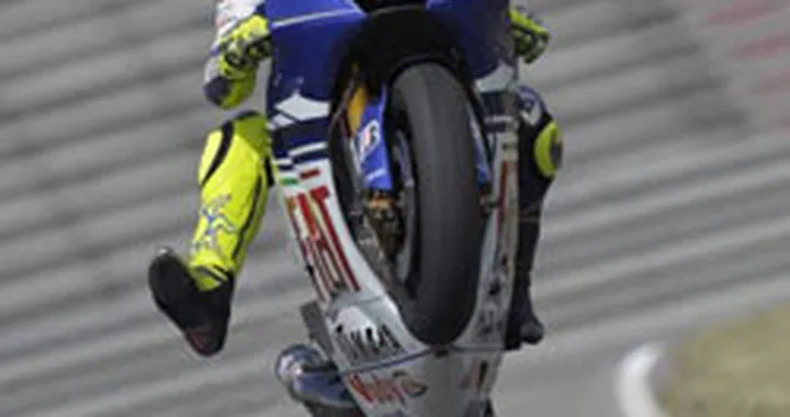 Capolavoro Rossi, Pedrosa e Stoner sul podio