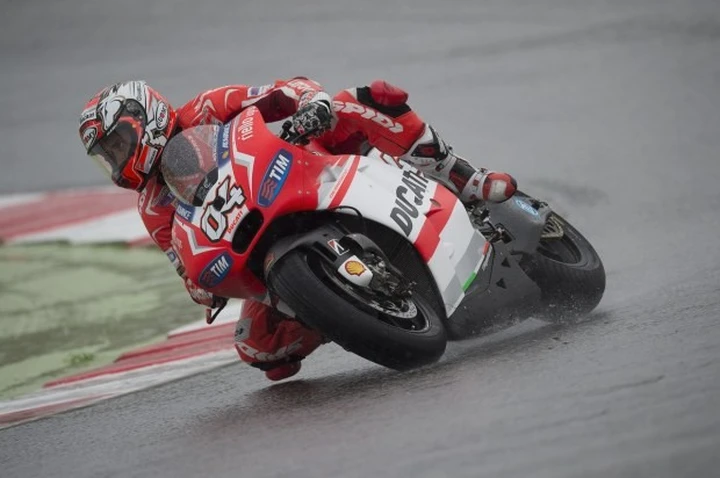 MotoGP Misano 2014: Andrea Dovizioso si impone nelle FP2 bagnate su Pedrosa, Marquez e Petrucci; Rossi 10° [FOTO]