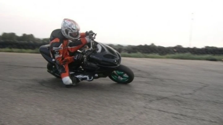 Scatto in Corsa: scooter in pista