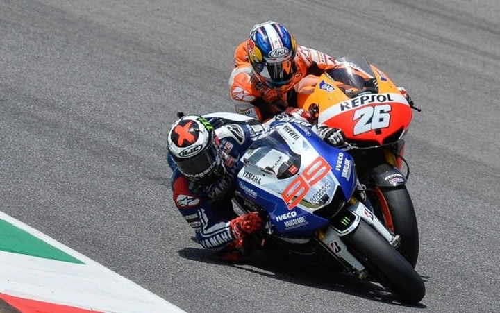 PAGELLE MotoGP Mugello, Lorenzo capolavoro, Pedrosa leader, Marquez autoeliminato, Rossi sportellato