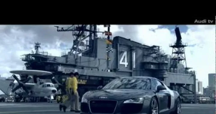 Video: Audi R8 VS Zivko Edge 540 Red Bull; drag race sulla portaerei Midway