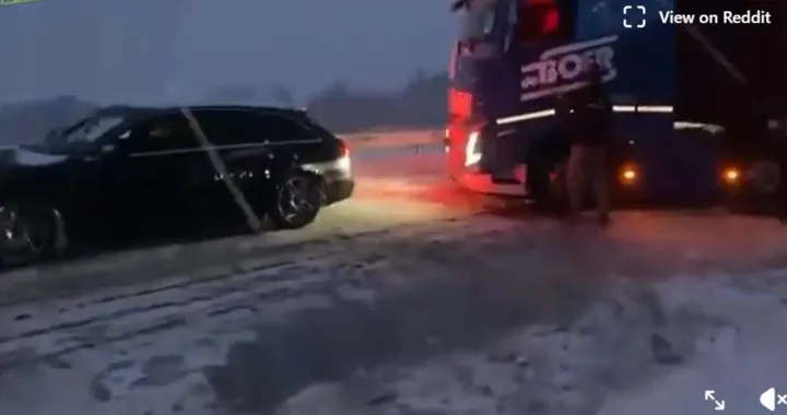 Audi A6 Quattro traina un camion nella neve: non è frutto di IA
